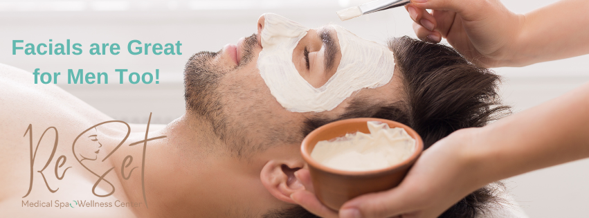 Image of dark haired male with face mask being applied. His eyes are closed and he is relaxed.